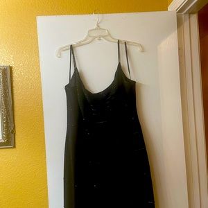 Lil black after five dress with black beading in a classic way.